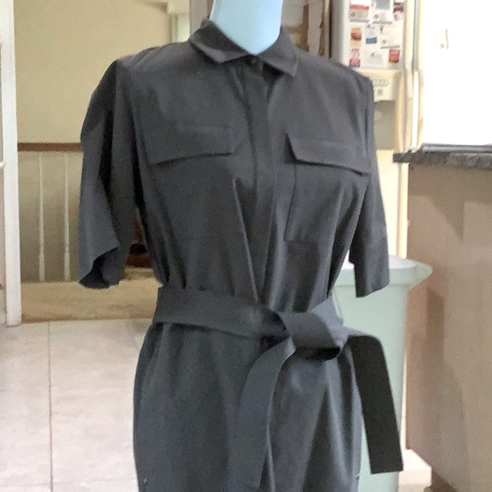 Brown with a touch of grey, mid calf length size 8 dress.